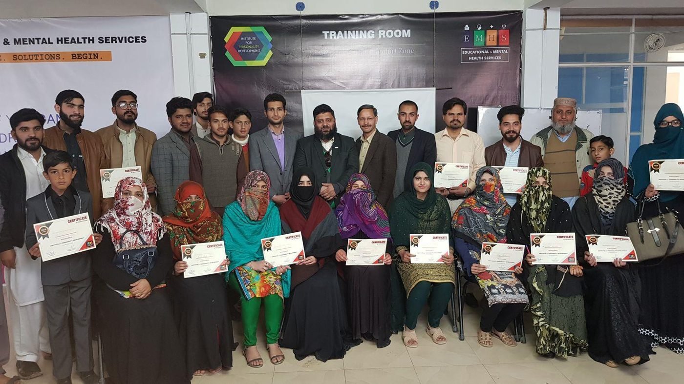 Participants holding certificates after a free seminar facilitated by Dr. Ahmed Ejaz
